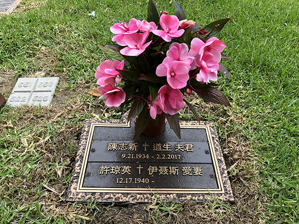 Michael Shackleford designing a grave marker with Chinese lettering